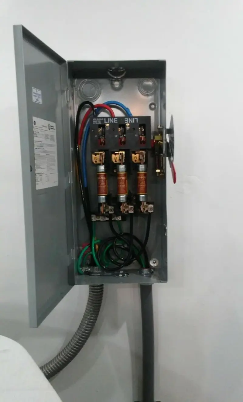 Three-phase disconnect switch installed for Smoke Detector Installation in French Island