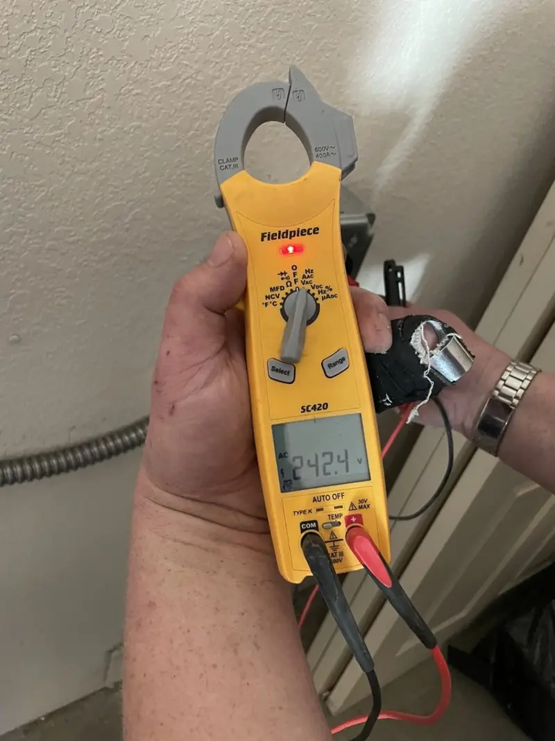 Voltage testing with clamp meter during Aluminum Wiring Replacement in French Island